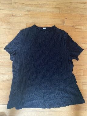 Like love short sleeve top. Like a puckered material. Lettuce edge sleeves . 3X